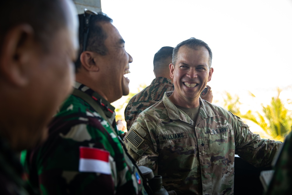 U.S. Army Brig. Gen. Kevin Williams, deputy commanding general of the 25th Infantry Division, observes the live fire training exercise with foreign military leaders during Super Garuda Shield