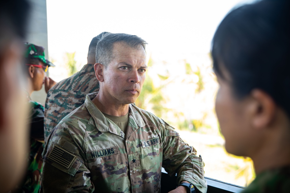 U.S. Army Brig. Gen. Kevin Williams, deputy commanding general of the 25th Infantry Division, observes the live fire training exercise with foreign military leaders during Super Garuda Shield