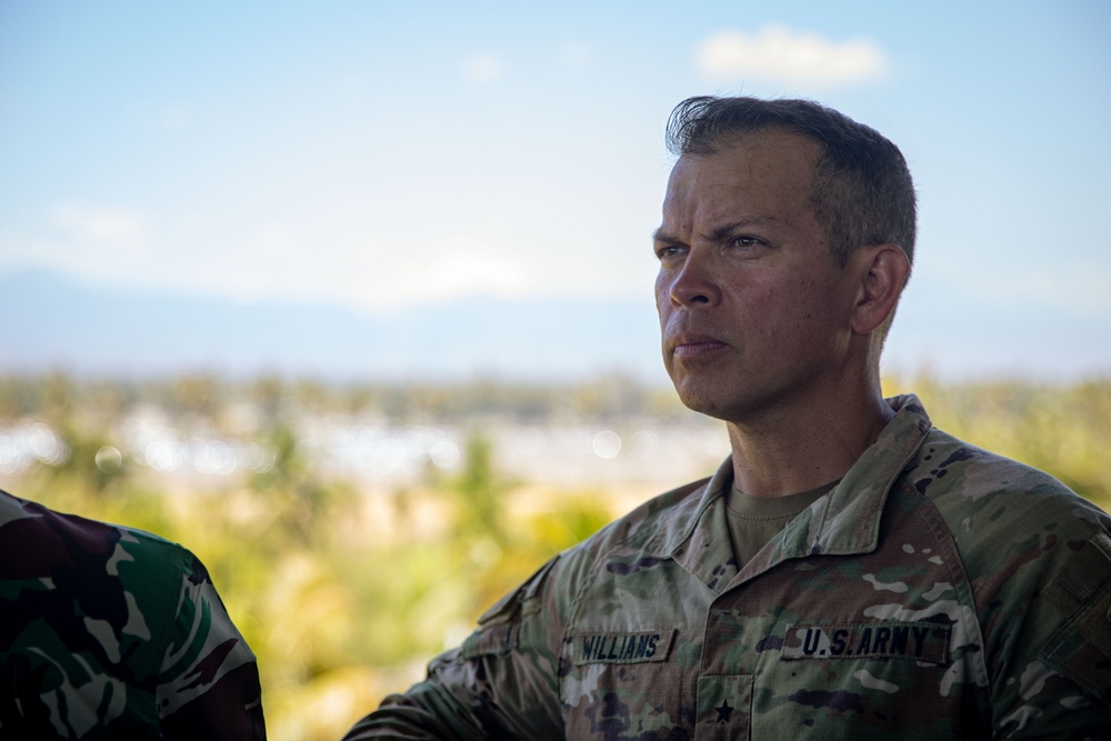 U.S. Army Brig. Gen. Kevin Williams, deputy commanding general of the 25th Infantry Division, observes the live fire training exercise with foreign military leaders during Super Garuda Shield