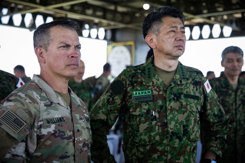 U.S. Army Brig. Gen. Kevin Williams, deputy commanding general of the 25th Infantry Division, observes the live fire training exercise with General Morishita of the Japanese Self Defense Force, during Super Garuda Shield