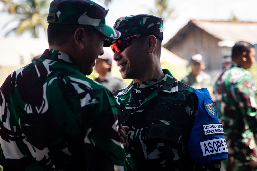 Members of the Indonesian National Armed Forces attend a ribbon cutting ceremony at the newly refurbished school in Palangan, Indonesia during Super Garuda Shield