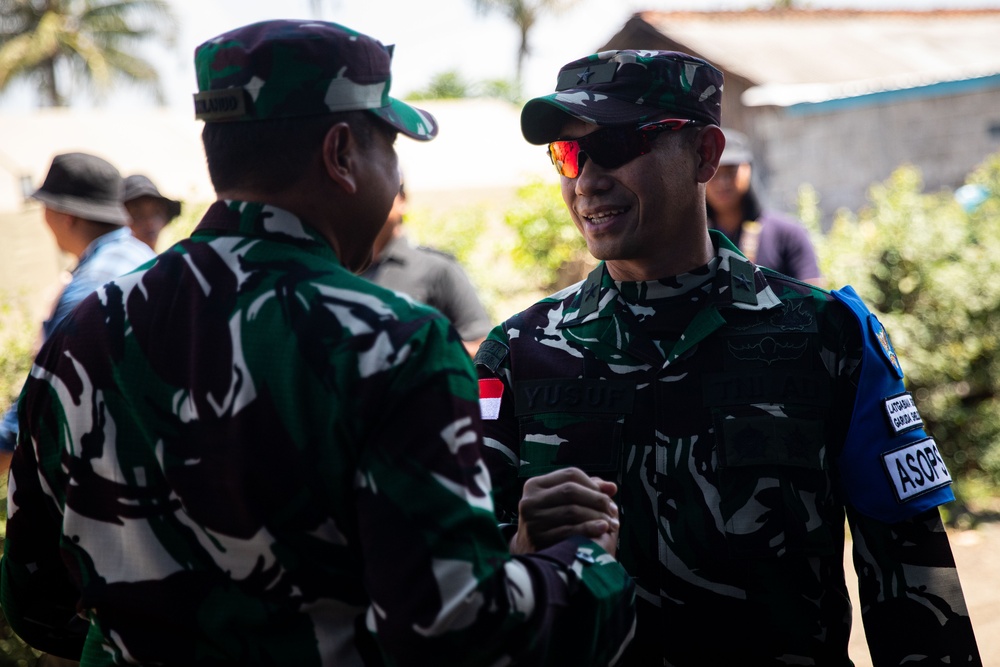 Members of the Indonesian National Armed Forces attend a ribbon cutting ceremony at the newly refurbished school in Palangan, Indonesia during Super Garuda Shield