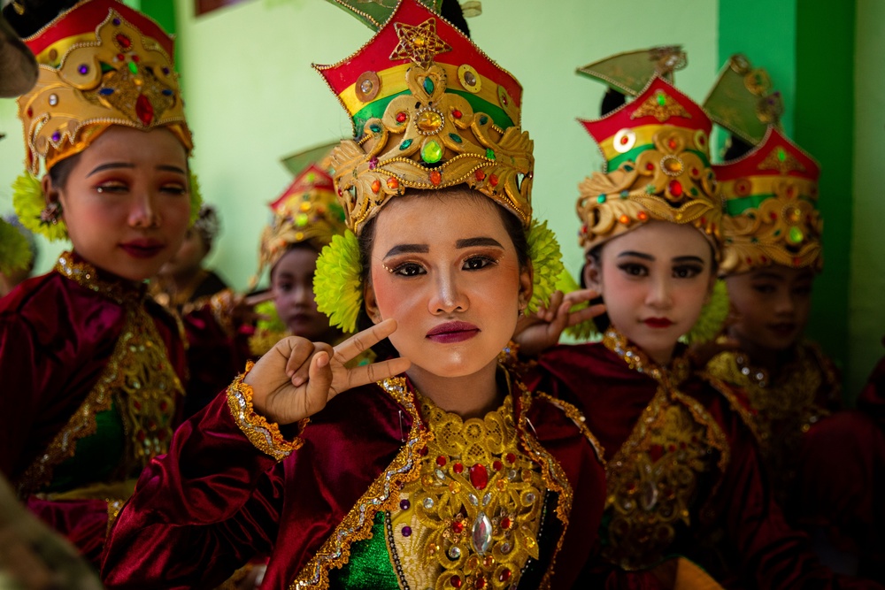 Children from Palangan, Indonesia prepare for their dance routine in celebration of their newly refurbished school during Super Garuda Shield, Sept. 5, 2024