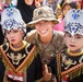 U.S. Army Capt. Jacqueline Krawiec, aide to New Zealand Army Col. Paul Hayward, deputy commander of interoperability of the 25th Infantry Division, with children from Palangan, Indonesia, during Super Garuda Shield, Sept. 5, 2024