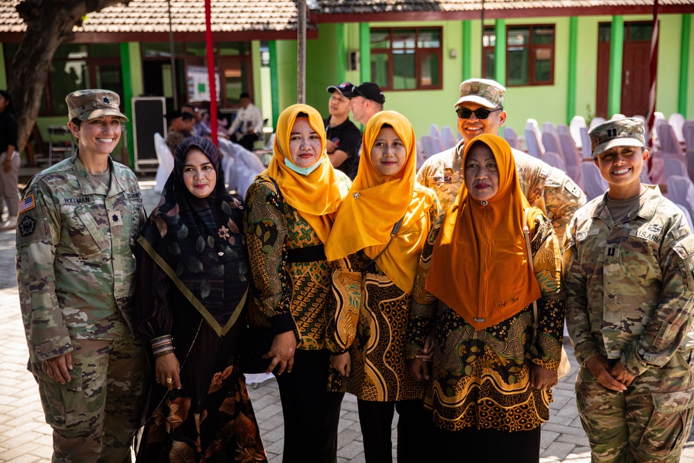 School teachers from Palangan, Indonesia, with U.S. Army Soldiers from the 523rd Engineering Support Company, during Super Garuda Shield, Sept. 5, 2024