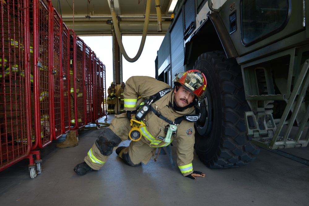 144th Firefighters Perform Hose Evolutions