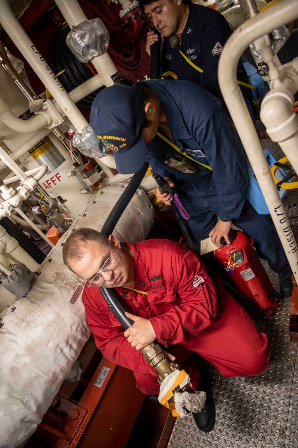 USS Ralph Johnson Conducts Main Space Fire Drill