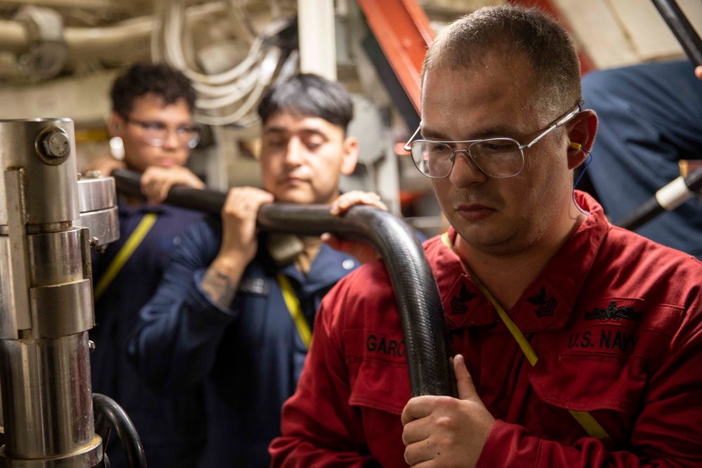 USS Ralph Johnson Conducts Main Space Fire Drill