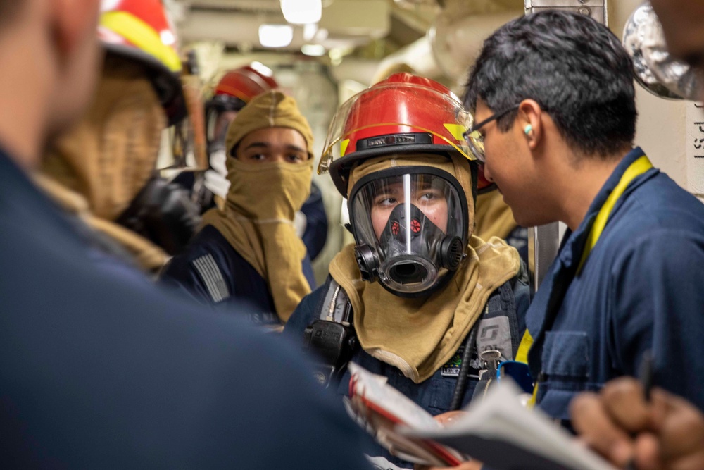 USS Ralph Johnson Conducts Main Space Fire Drill