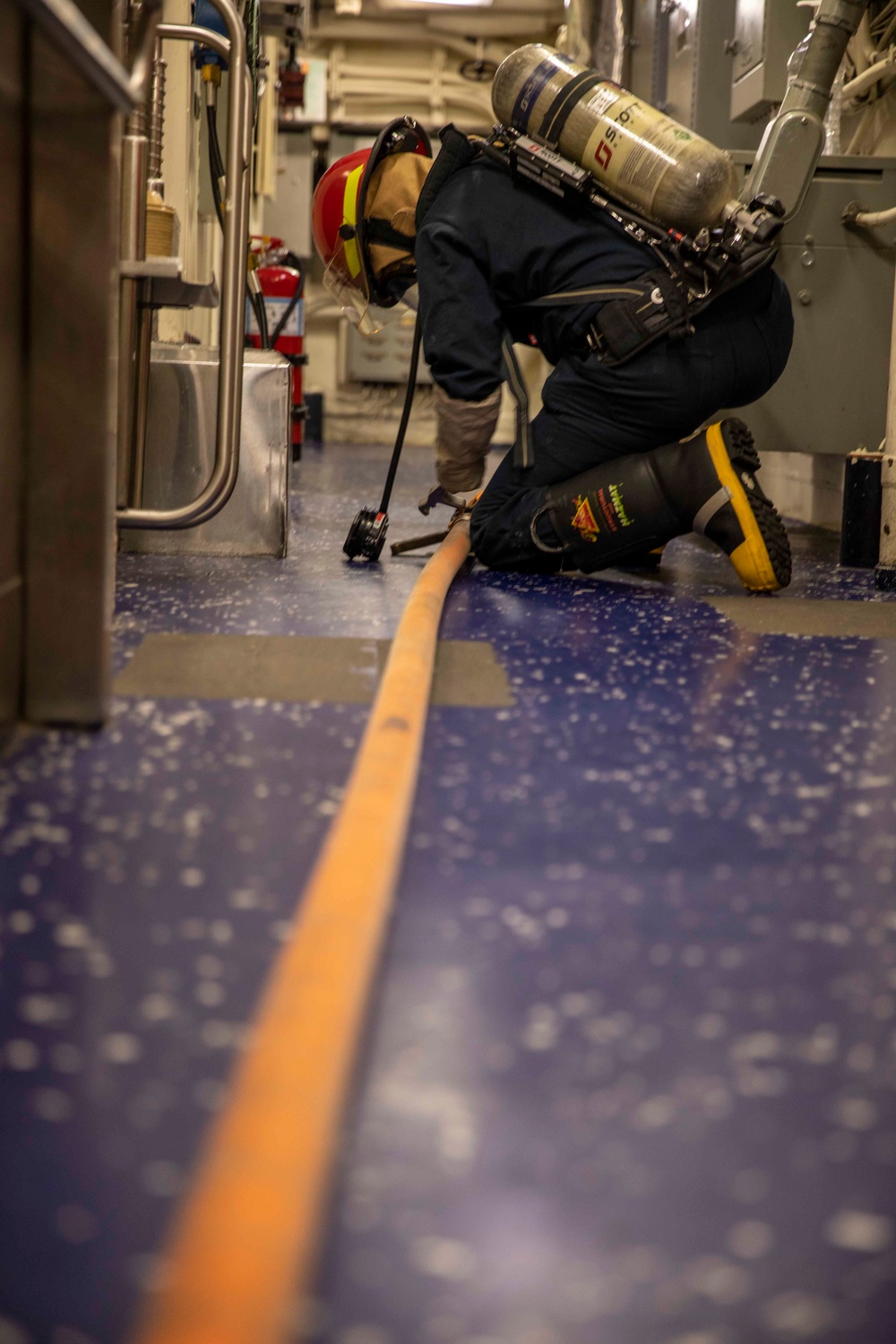 USS Ralph Johnson Conducts Main Space Fire Drill