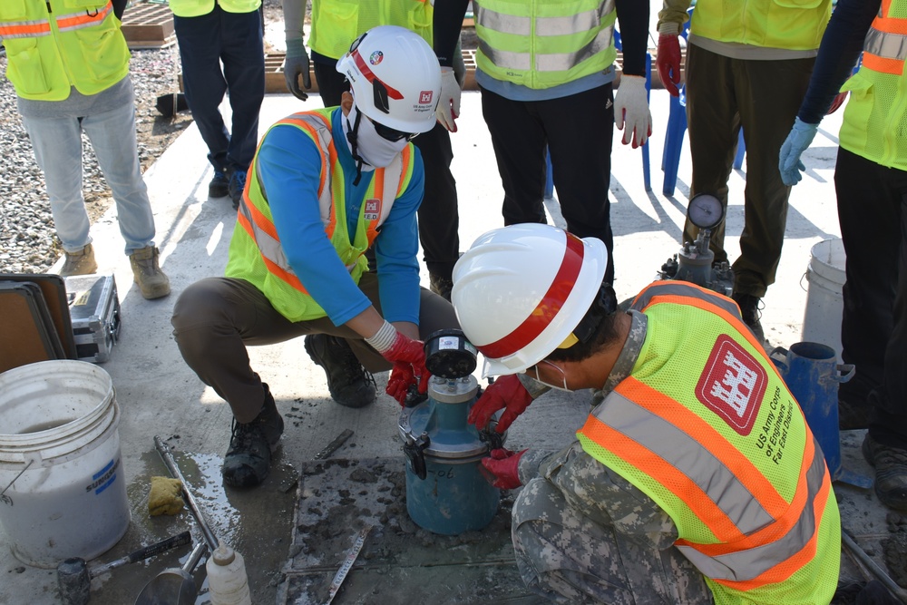 Army engineers place concrete for future barracks on Camp Humphreys, South Korea