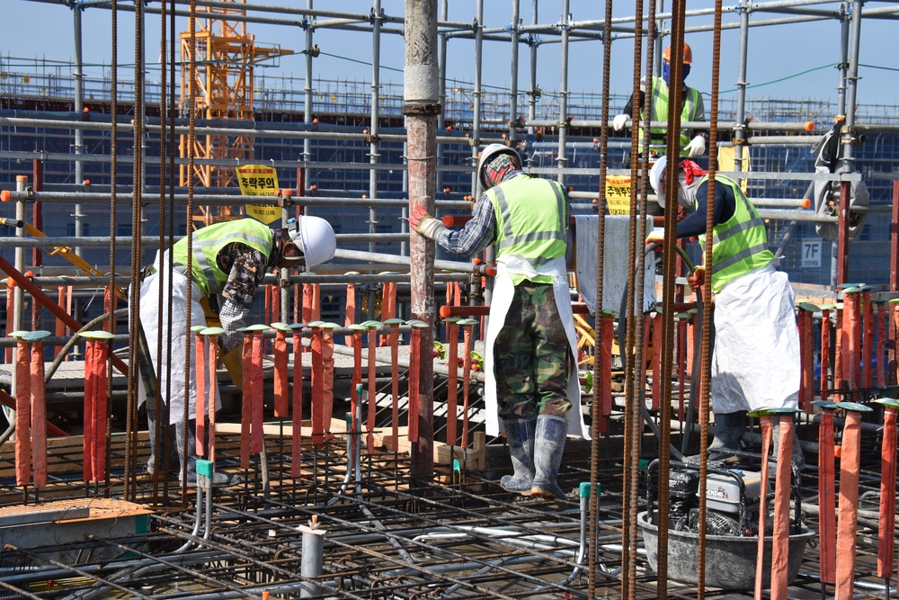 Army engineers place concrete for future barracks on Camp Humphreys, South Korea