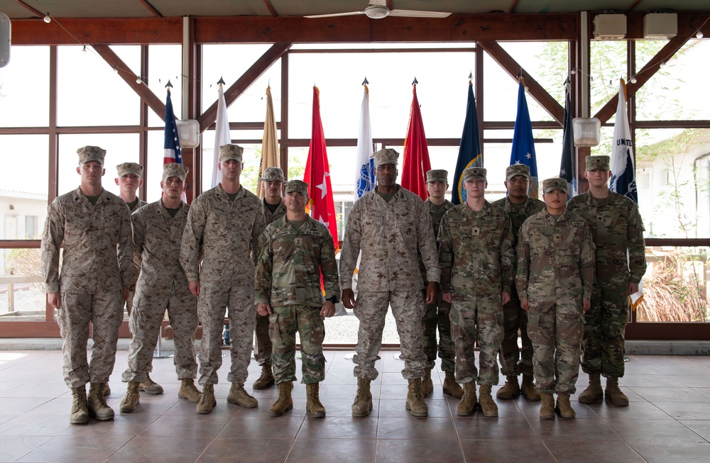 Gen. Langley presents coins at Camp Lemonnier