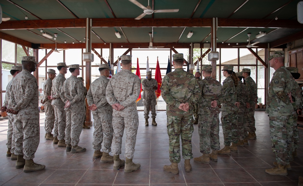 Gen. Langley presents coins at Camp Lemonnier