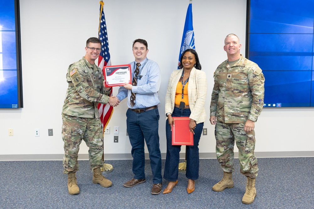 Col. Christopher Klein Presents Leadership Development Program Tier 1 Certificate to Engineer Mitch Lawrence, Joined by Advisors Vanessa Francis Gray and Lt. Col. Daniel Terbilcox