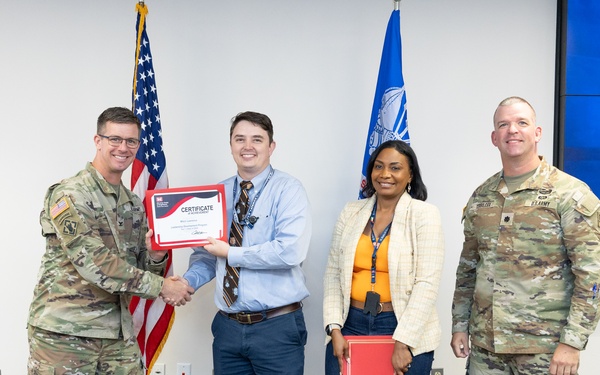 Col. Christopher Klein Presents Leadership Development Program Tier 1 Certificate to Engineer Mitch Lawrence, Joined by Advisors Vanessa Francis Gray and Lt. Col. Daniel Terbilcox