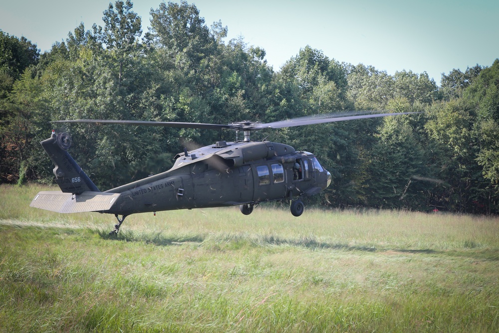 Infantry Soldiers conduct air insertion during training