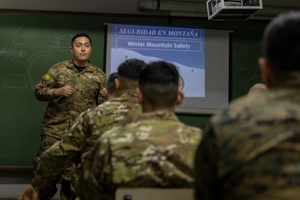 U.S. Marine Corps Mountain Warfare Instructors exchange knowledge with Argentine marines during pre-environmental training