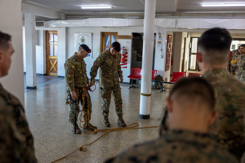 U.S. Marine Corps Mountain Warfare Instructors exchange knowledge with Argentine marines during pre-environmental training