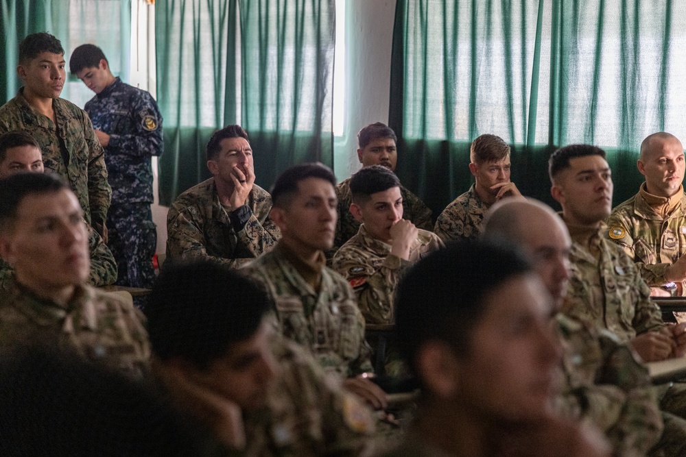 U.S. Marine Corps Mountain Warfare Instructors exchange knowledge with Argentine marines during pre-environmental training
