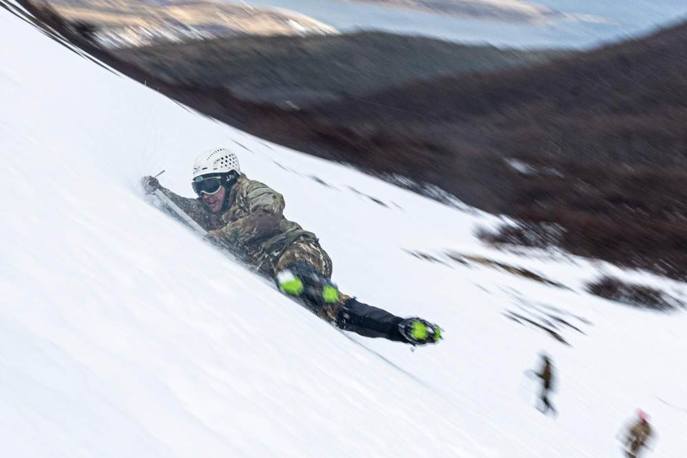 U.S. Marine Corps Mountain Warfare Instructors conduct cold-weather rescue training with Argentine marines