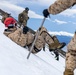 U.S. Marine Corps Mountain Warfare Instructors conduct cold-weather rescue training with Argentine marines