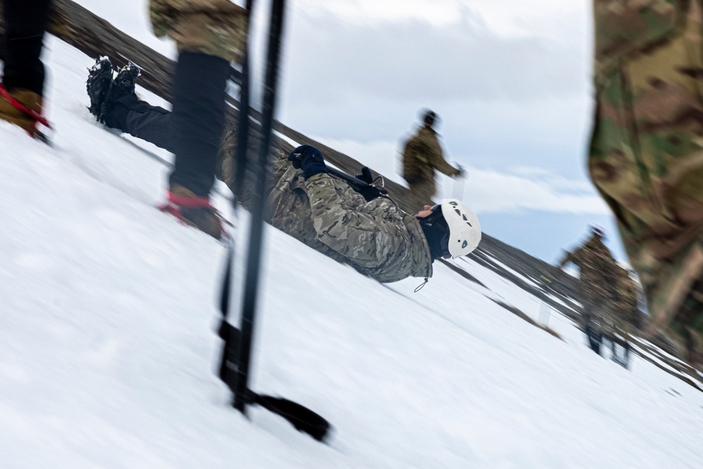 U.S. Marine Corps Mountain Warfare Instructors conduct cold-weather rescue training with Argentine marines