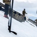 U.S. Marine Corps Mountain Warfare Instructors conduct cold-weather rescue training with Argentine marines