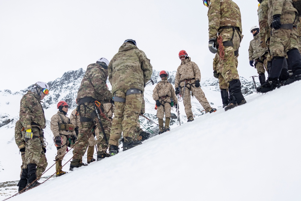 U.S. Marine Corps Mountain Warfare Instructors conduct cold-weather rescue training with Argentine marines