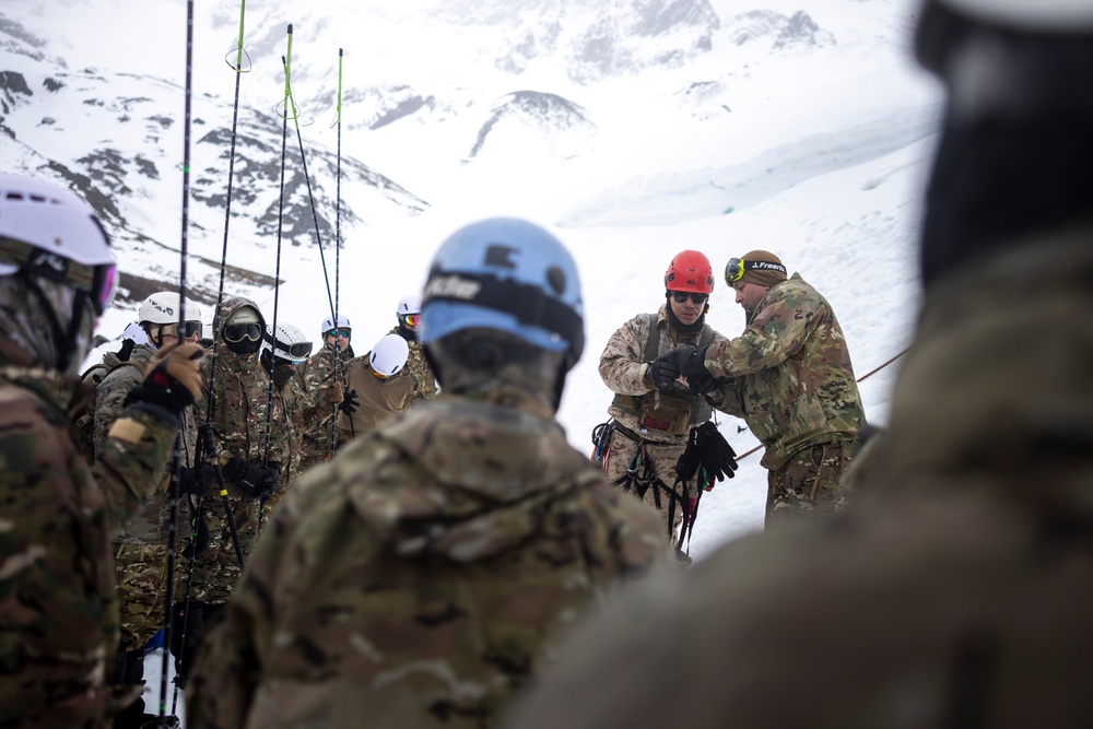 U.S. Marine Corps Mountain Warfare Instructors conduct cold-weather rescue training with Argentine marines