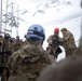 U.S. Marine Corps Mountain Warfare Instructors conduct cold-weather rescue training with Argentine marines