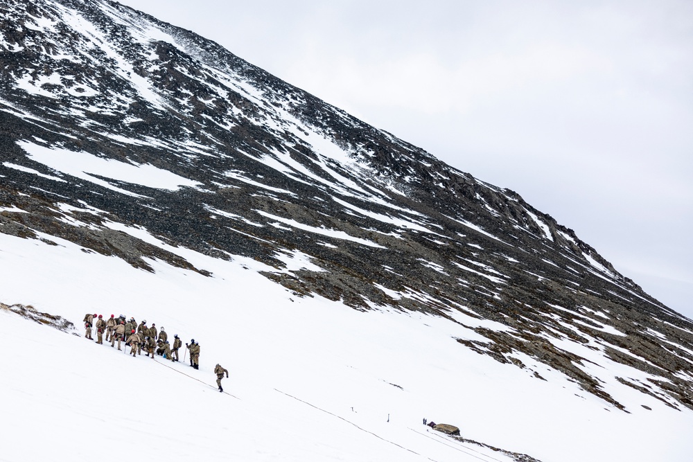 U.S. Marine Corps Mountain Warfare Instructors conduct cold-weather rescue training with Argentine marines