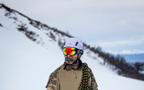 U.S. Marine Corps Mountain Warfare Instructors conduct cold-weather rescue training with Argentine marines
