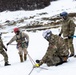 U.S. Marine Corps Mountain Warfare Instructors conduct cold-weather rescue training with Argentine marines