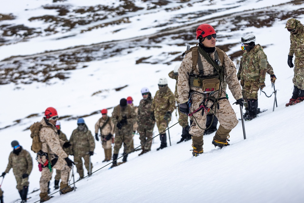 U.S. Marine Corps Mountain Warfare Instructors conduct cold-weather rescue training with Argentine marines