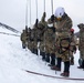 U.S. Marine Corps Mountain Warfare Instructors conduct cold-weather rescue training with Argentine marines