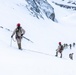 U.S. Marine Corps Mountain Warfare Instructors climbs toward mountain summit with Argentine marines