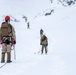 U.S. Marine Corps Mountain Warfare Instructors climbs toward mountain summit with Argentine marines