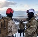 U.S. Marine Corps Mountain Warfare Instructors climbs toward mountain summit with Argentine marines