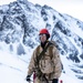 U.S. Marine Corps Mountain Warfare Instructors climbs toward mountain summit with Argentine marines