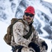 U.S. Marine Corps Mountain Warfare Instructors climbs toward mountain summit with Argentine marines