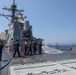 Sailors aboard the USS Howard conduct a freshwater washdown in Sagami Wan