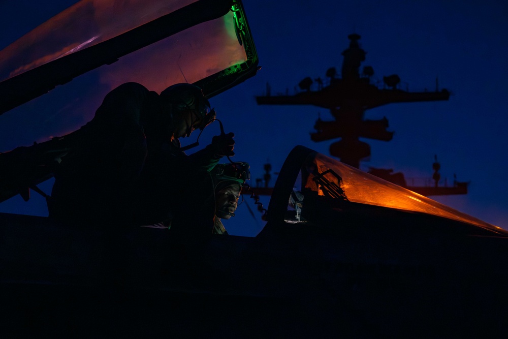 Super Hornet Maintenance Aboard Theodore Roosevelt at Night