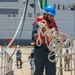 Sailors aboard the USS Howard conduct a sea and anchor detail in Okinawa, Japan