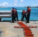 Sailors aboard the USS Howard conduct a sea and anchor detail in Okinawa, Japan