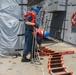 Sailors aboard the USS Howard conduct a sea and anchor detail in Okinawa, Japan