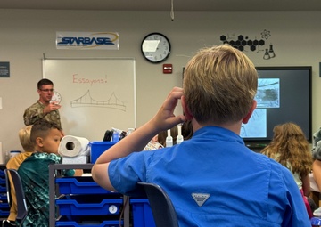 COL Klein delivers an engaging lecture at the STARBASE Academy