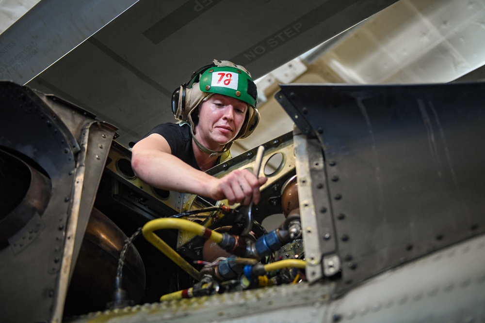 Maintenance in the Hangar Bay Aboard Theodore Roosevelt