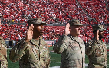 1st TSC Soldiers reenlist during half time while Cardinals mark another win