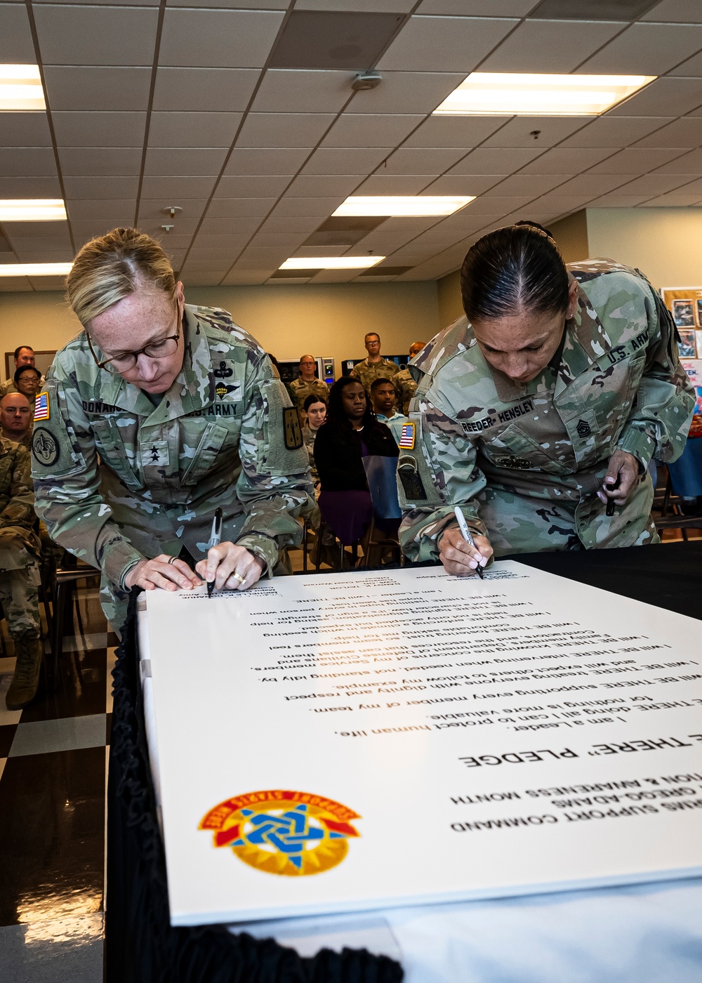 Senior leaders sign Suicide Prevention Month pledge